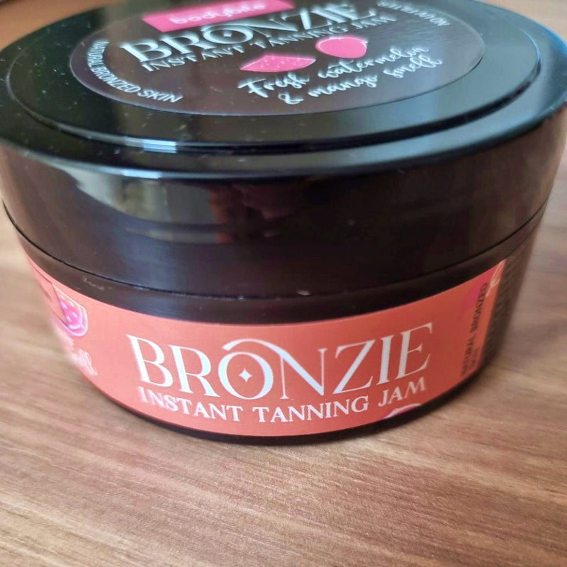 BRONZIE Instant Tanning Jam with Watermelon and Mango in a sleek jar for beautiful bronzed skin